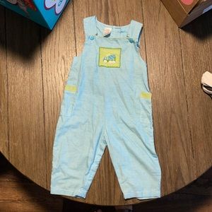 Smocked onsie with cement truck